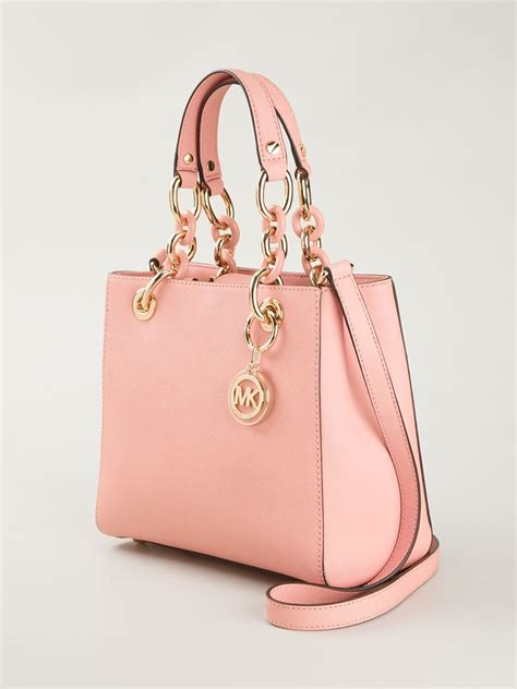 michael kors pink hand bag.